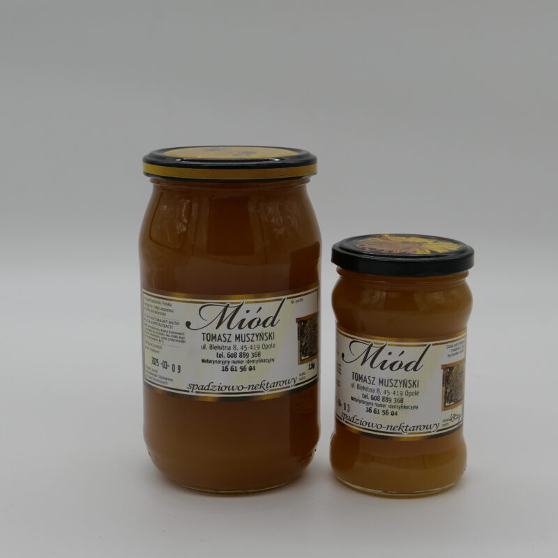 Obrazek przedstawia 2 słoiki miodu spadziowo-nektarowego jeden 1,1kg a drugi 430g